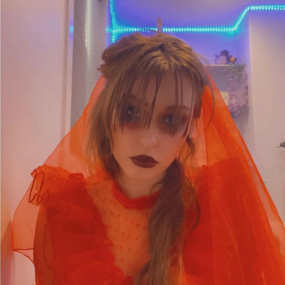 lydia deetz halloween costume: red wedding dress with red vail and lace gloves